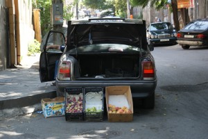 Selling fruit out of the trunk of the car