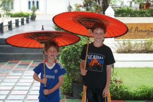 The boys with their traditional umbrellas
