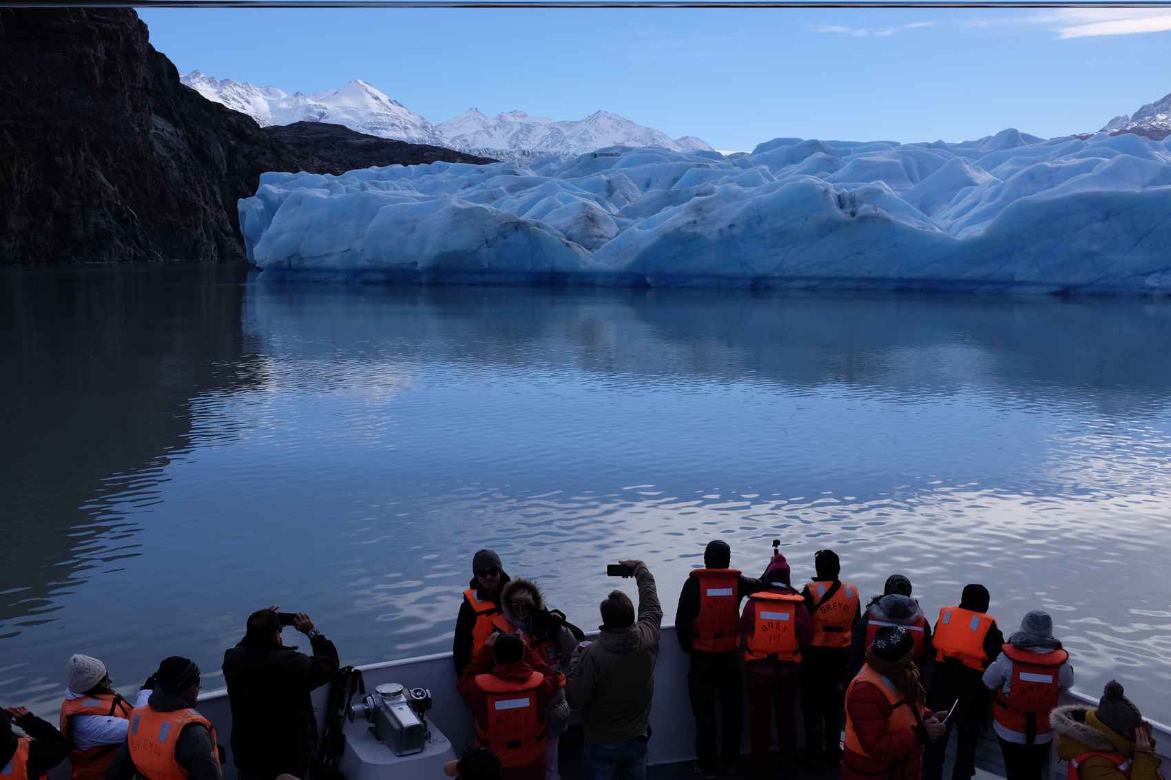 People looking at a glacier in Patagonia