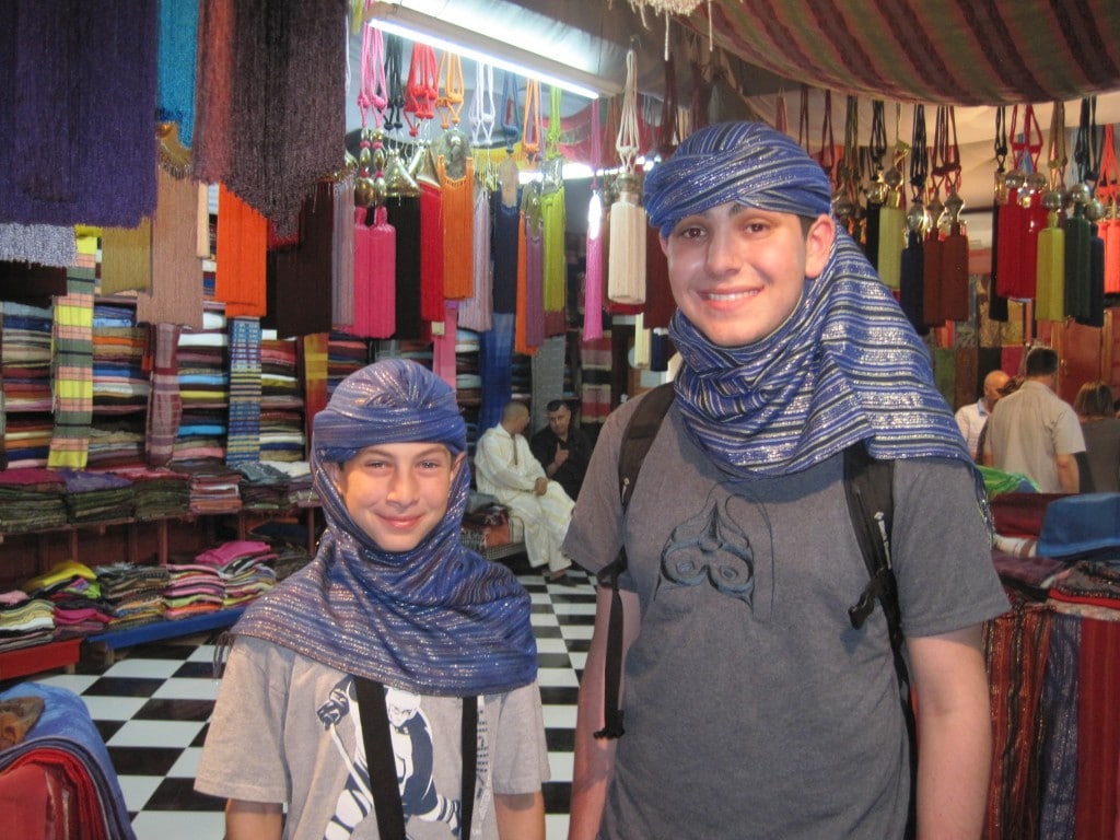 two boys wearing burqa in morocco